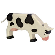 Vache broutant noire Holztiger