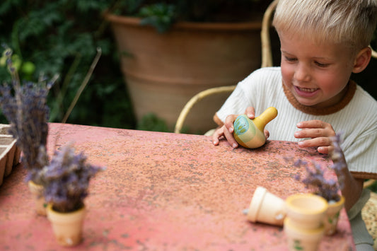 Flowing yellow bird Culbutos en bois Grapat